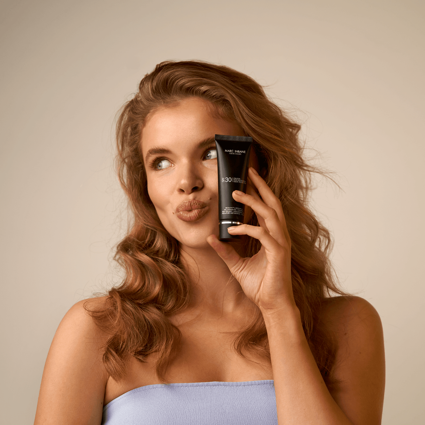 Marc Inbane Crème Solaire SPF30 med model